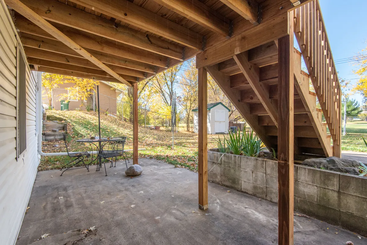 Expansive elevated wooden deck with railing and scenic overlook, Sarpy County