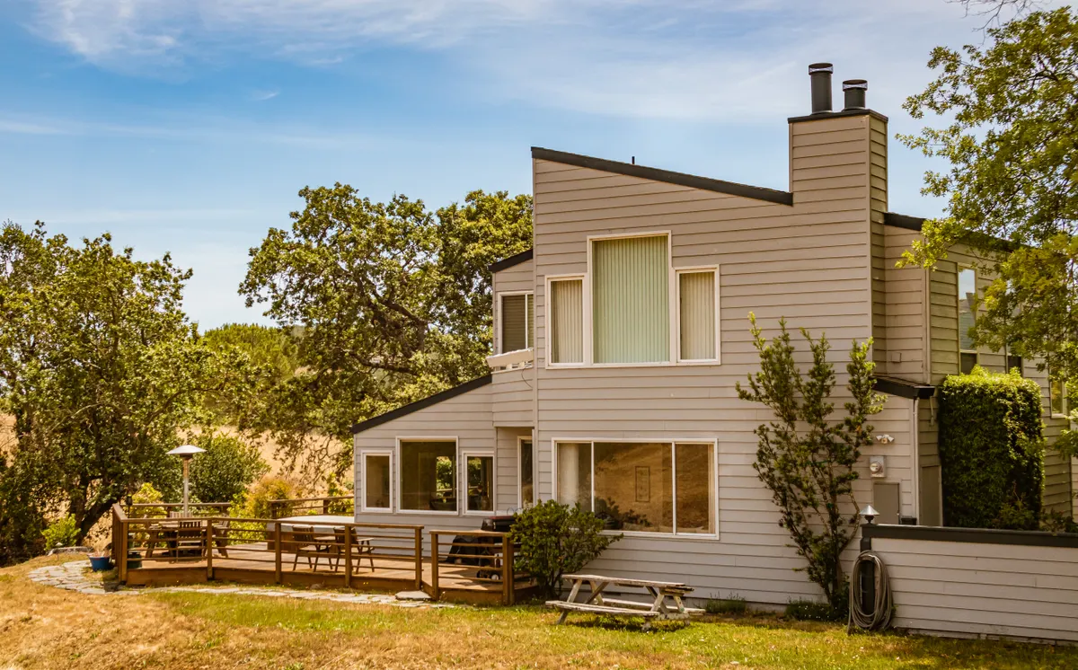 Backyard patio deck with seating in the Cimarron area of Millard