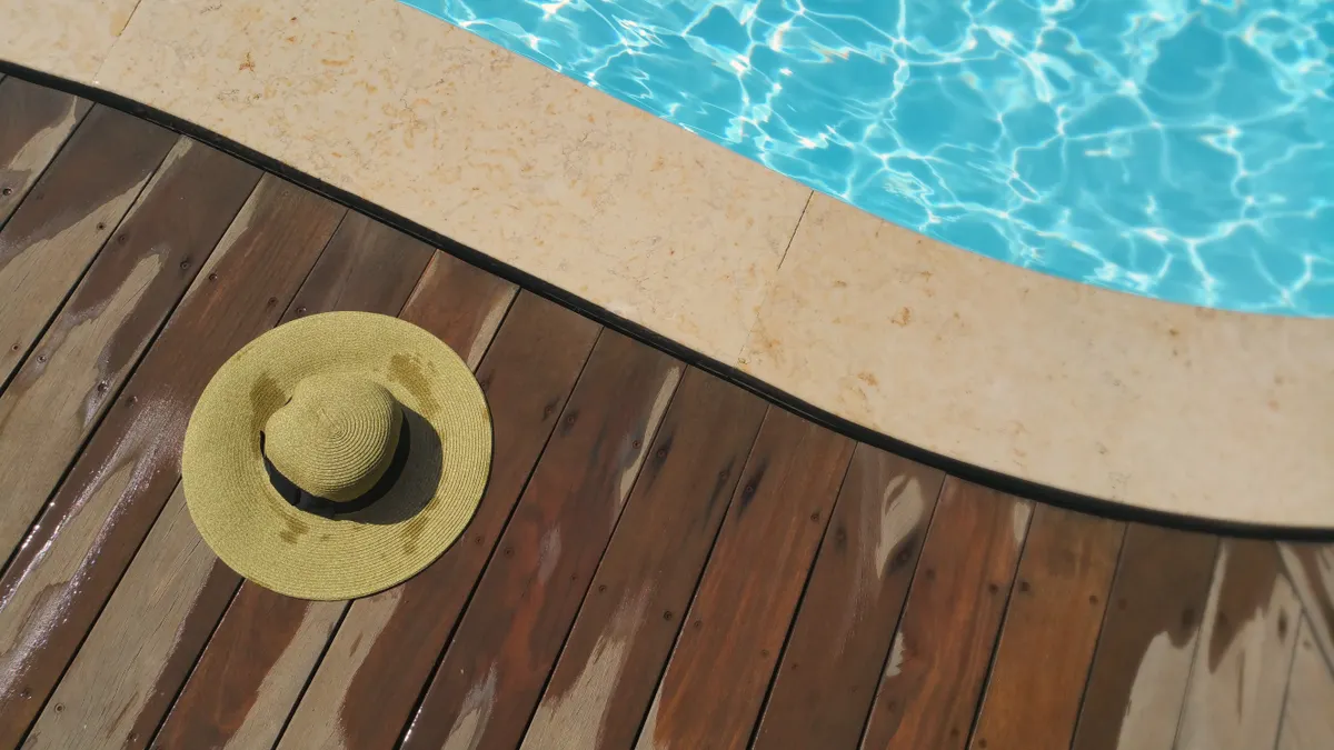 Backyard pool deck surround in South Elkhorn