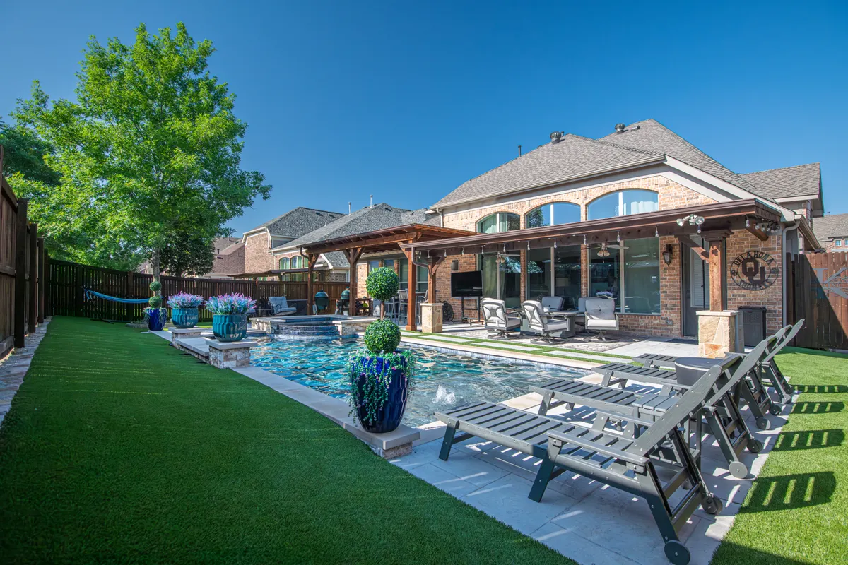Backyard pool deck surround at a Papillion, NE home