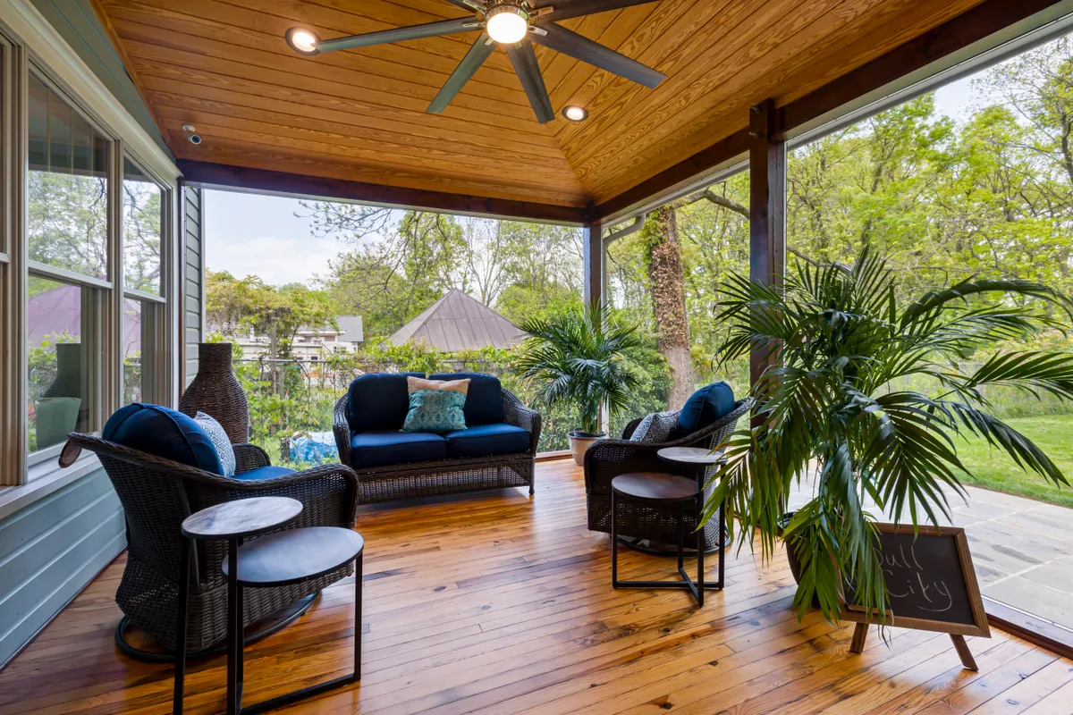 Composite deck flooring with patio seating and greenery, Douglas County