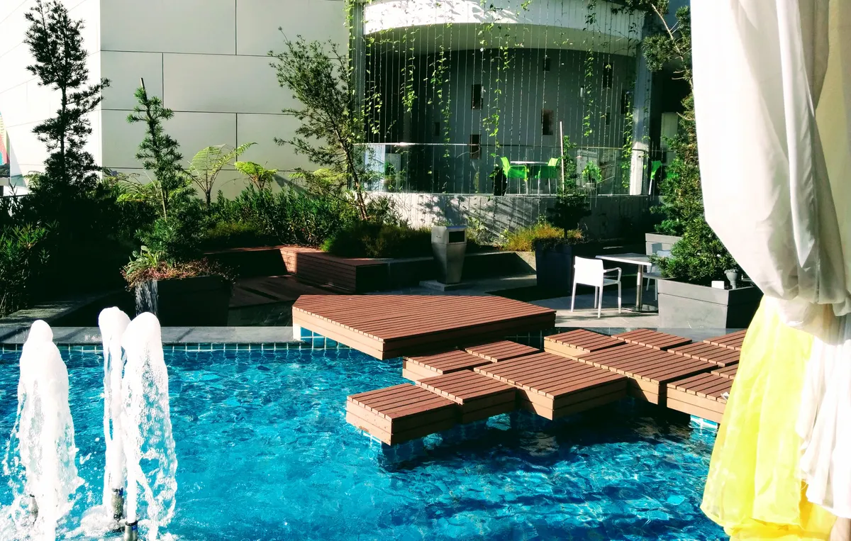 Luxurious multi-level outdoor deck and pool area, west Omaha